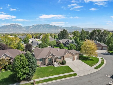 Aerial view of residential area featuring a mountainous background