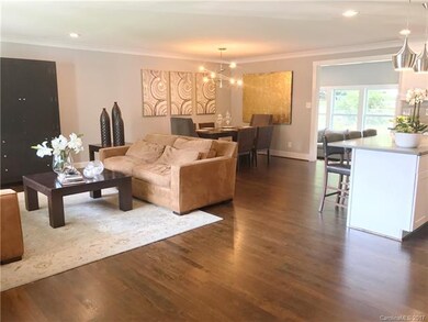 Showing parts of living room, dining area, kitchen