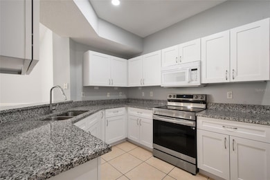 5542 Metrowest Blvd unit 10, Orlando, FL 32811 - photo 7