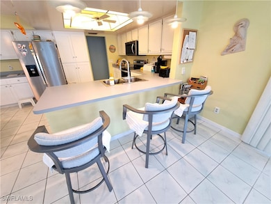Kitchen with appliances with stainless steel finis