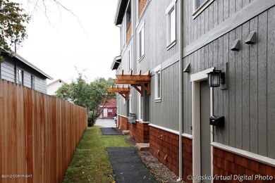 Paved walkway to main entry & garage ent