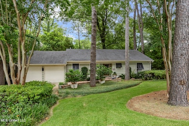 Nestled on Tree-Bordered Lot