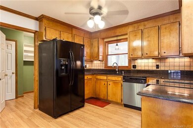 Another view of the kitchen leading into the laund