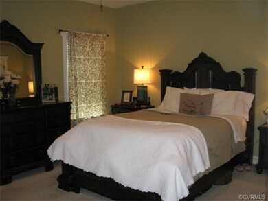 Spacious master with large closet, recessed lighting, attached master bath with shower, travertine tile, granite vanity top