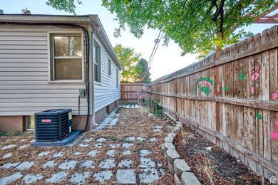 View of property exterior featuring a fenced backyard and a central AC unit