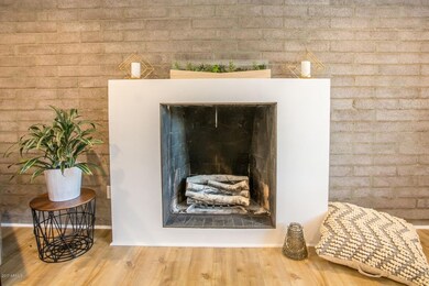 Fireplace against exposed block wall