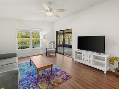 Living Room with a view of Pond through the Lanai