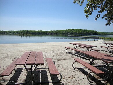 Sandy beach on Fawn Lake and boat basin