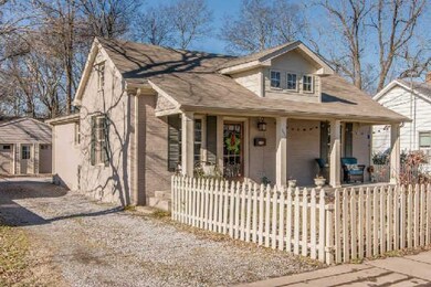 2 car detached garage and a cute picket fence!