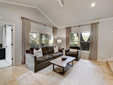 Living room featuring light tile patterned floors