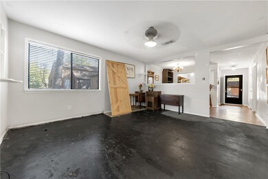 Another view of living room from back door toward