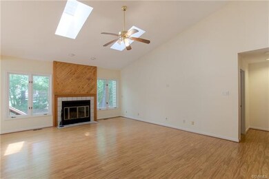 Another view of the Family Room with a wood burnin
