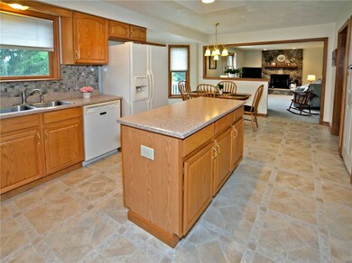 Kitchen Island with view to open floor plan to Fam