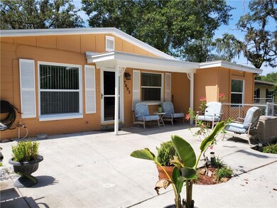 Notice ALL of the NEW WINDOWS and this front patio
