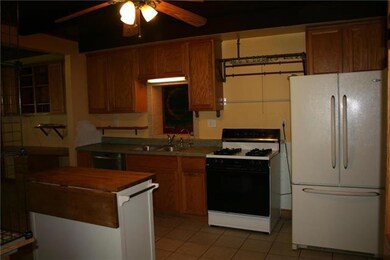 Kitchen has a pass-through to the family room.