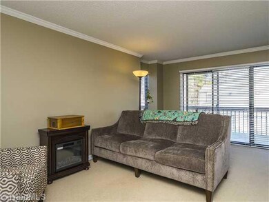 Den/Family/Great Room. The great room receives plenty of natural light from the triple door system that leads to the deck.
