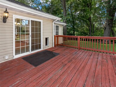 The roomy deck off the kitchen will come back to life with some weekend maintenance!