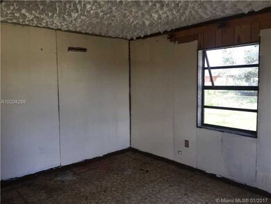 688 SW 9th St, Belle Glade, FL 33430 - photo 7