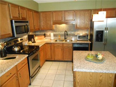 Updated kitchen with granite counter tops/tile flo