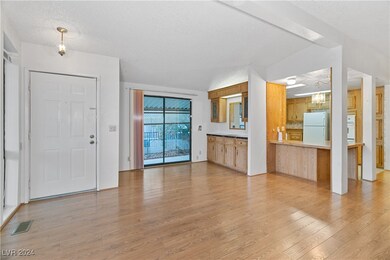 Living room with wood laminate flooring and front