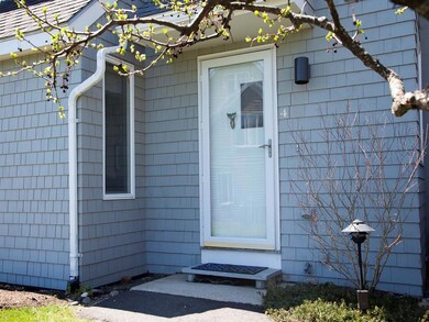 A welcoming front door surrounded by...