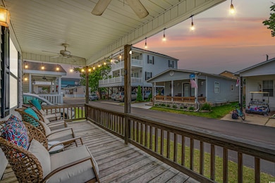 Deck at dusk featuring ceiling fan