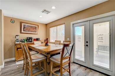Dining space featuring recessed lighting, visible