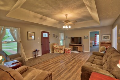 This view is from the hall way. The door straight ahead leads to the master bedroom.