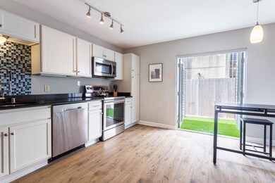 Kitchen has French doors to back yard-patio