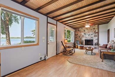 The large windows bring in an abundance of natural light and lake views.