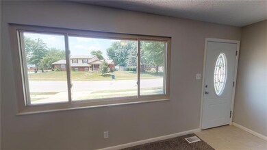 Huge Portrait Window To Bring in Some Sunlight!