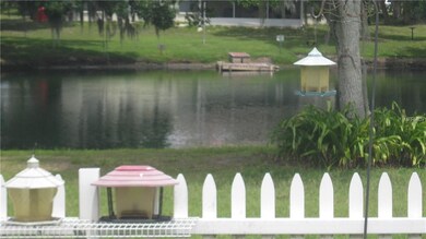 PICKET FENCE AROUND THE POOL.  PROPERTY GOES INTO 
