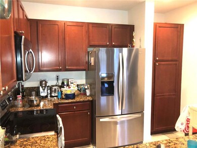 Kitchen features a food size pantry