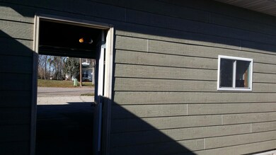 olson view from patio through garage w s