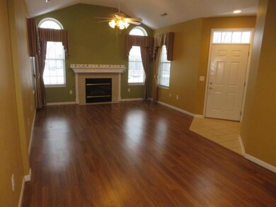 05 View 2 into living room and front ent