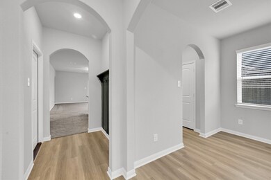 Fresh vinyl floors welcome you upon entry.