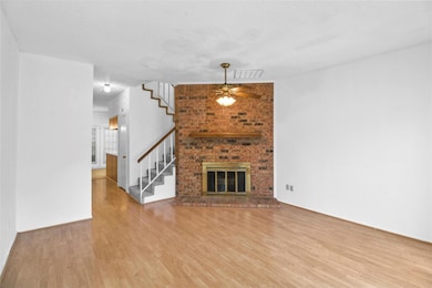 Unfurnished living room with a textured ceiling, v
