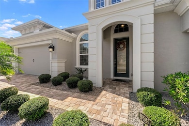 Landscaped Beds line Pavers Walkway to Front Door