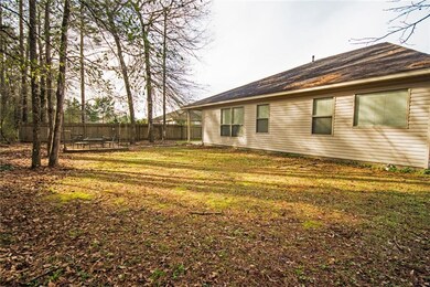 Spacious yard backed up to the woods.