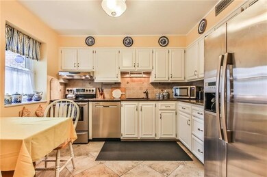 Eat-in Modern KitchenCrisp White Cabinetry