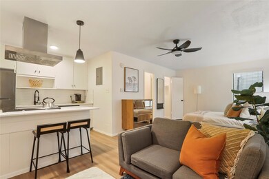 Living room with light wood-style floors, ceiling