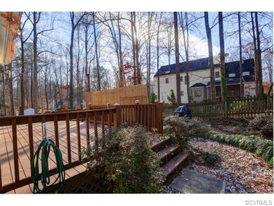 Multi-tiered deck with privacy screen. Section rea