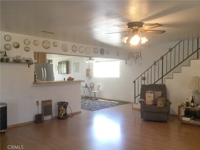 Family room towards kitchen, which represents the end of the original 3 bedroom home.
