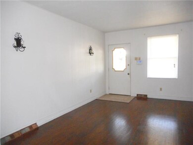 Living room with hardwood flooring