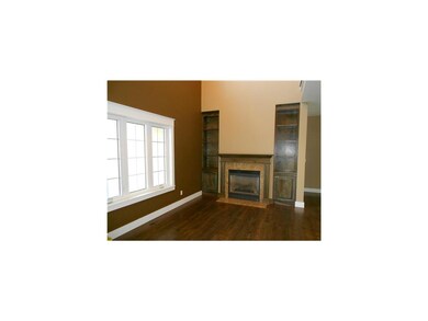 Living Room. Beautiful living/hearth room welcomes