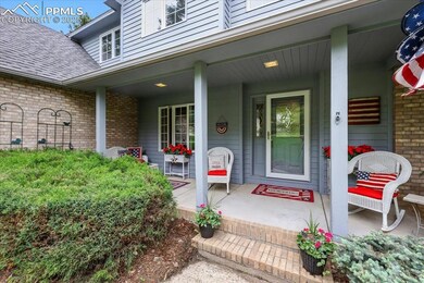 Imagine welcoming guests on this spacious, covered front porch.