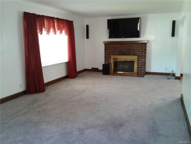 Living Room w/wood burning fireplace