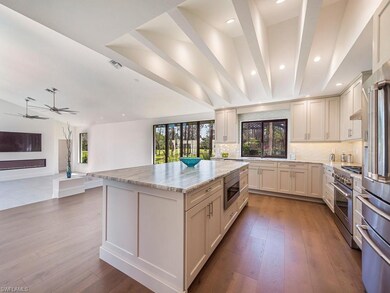 Island Kitchen with Leather Finish Quartz Countert