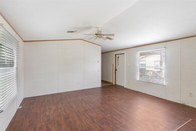 This room features a clean, open space with wood-s