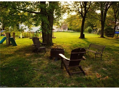 Rear yard has garden space, fire pit and plenty of